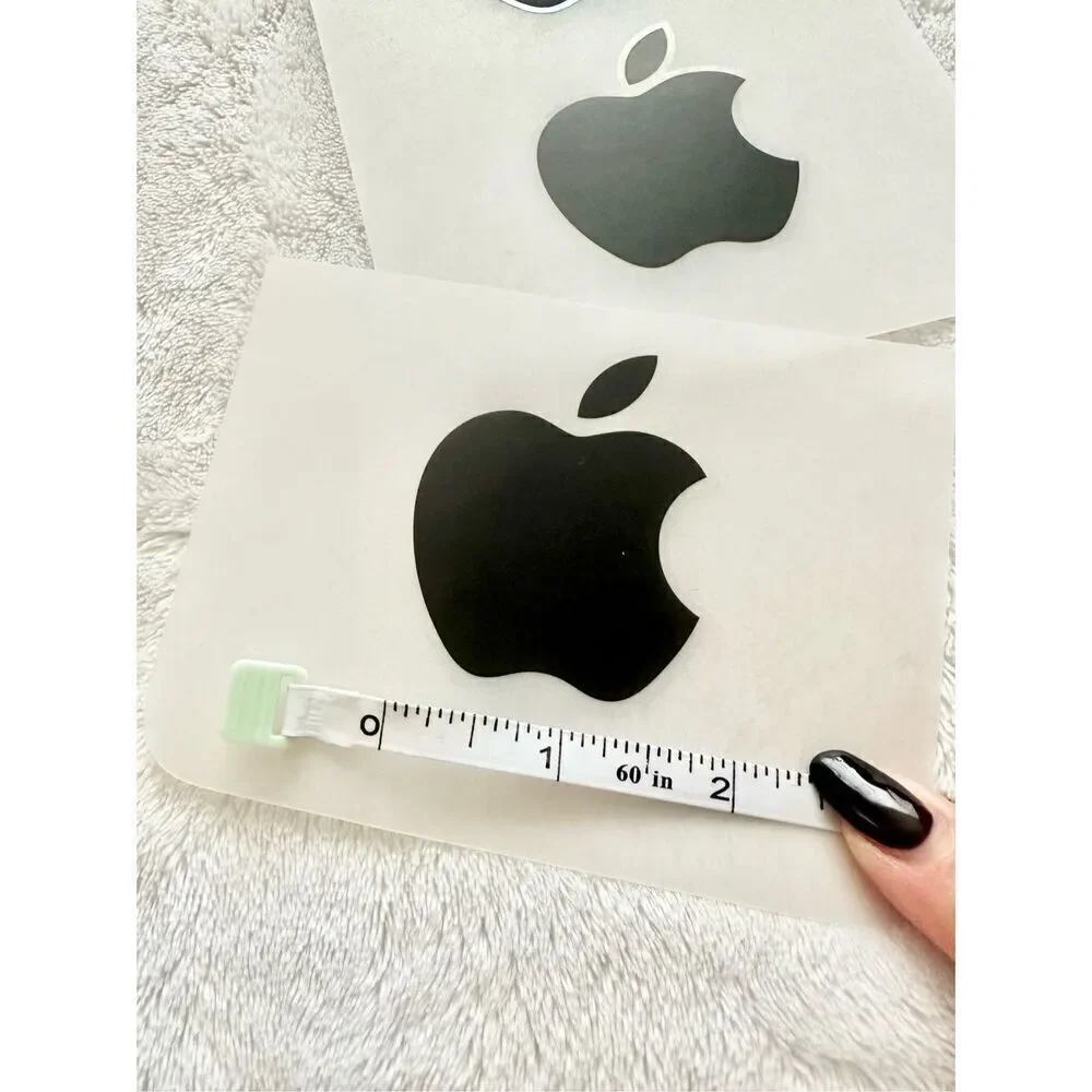 Set of three black apple stickers ￼